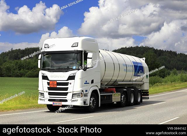 White Scania R500 semi tanker Kiitosimeon Oy transports Carbon Dioxide, ADR code 22-2187, along highway in the summer. Salo, Finland. June 24, 2021