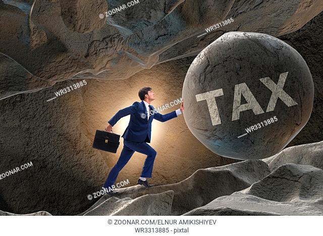 Businessman in high taxes business concept