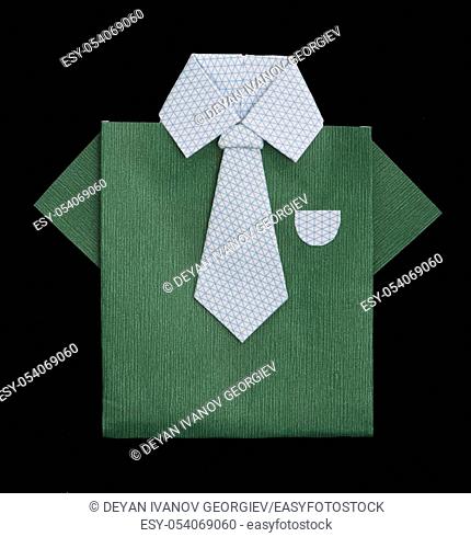Isolated paper made green shirt with white tie. Folded origami style