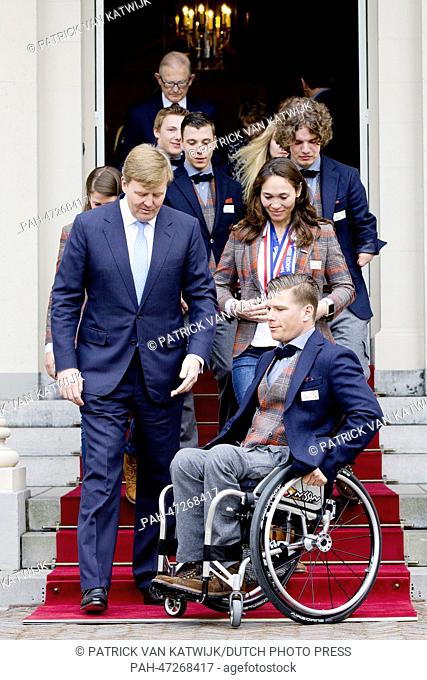 Dutch King Willem-Alexander (C), receives Dutch participants of the Paralympic Games 2014 in Sochi, Bibian Mentel (Gold, Snowboard, center R)