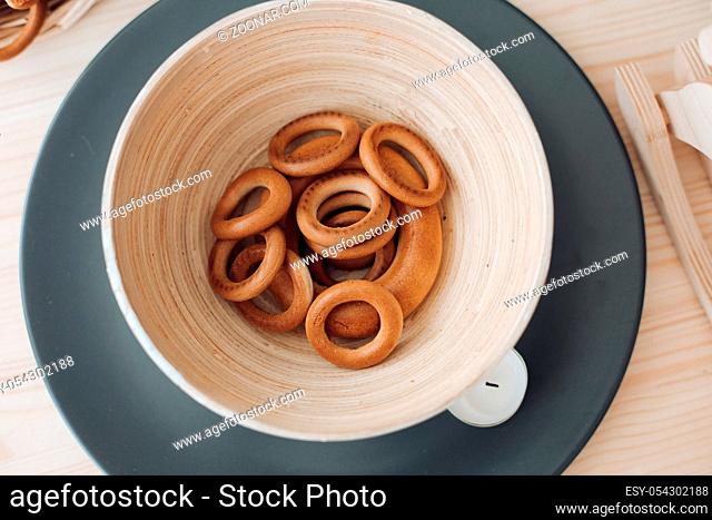 Bagels in a plate on the table. Delicious and appetizing in a light plate