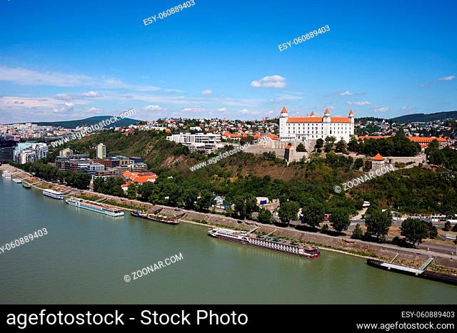 Slovakia, capital city cityscape at Danube river, Bratislava Castle on Little Carpathians hill