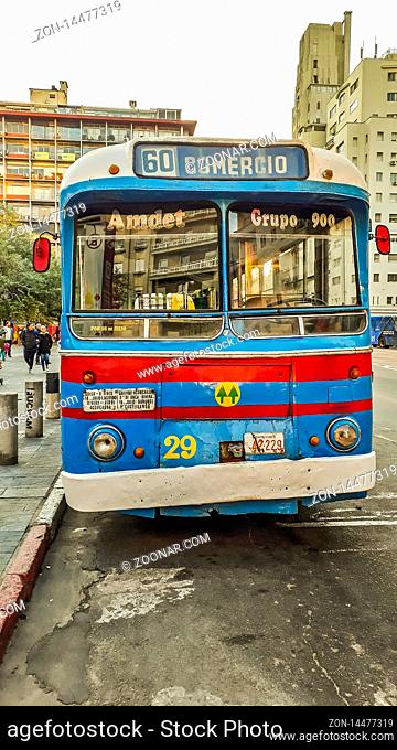MONTEVIDEO, URUGUAY, OCTOBER - 2019 - Antique old public bus transport parked at 18 de julio street at national celebration day