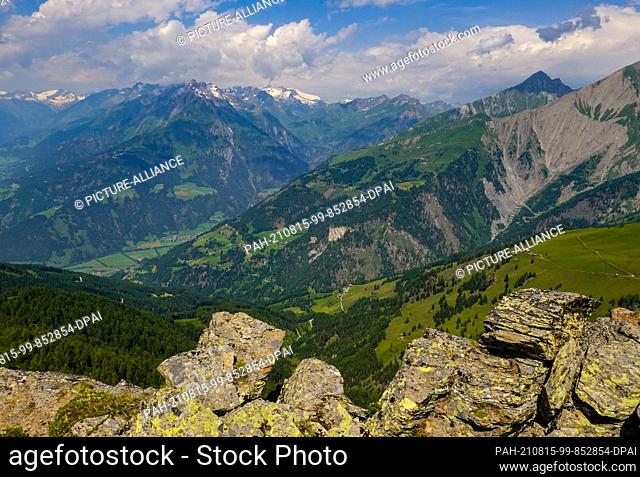 24 July 2021, Austria, Kals Am Großglockner: View from a mountain between the villages Matrei and Kals in the National Park Hohe Tauern