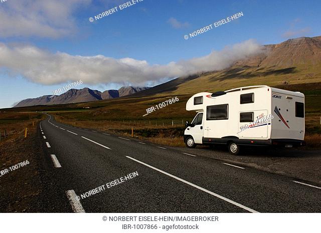 Camper van on a road in the northeast of Iceland, Europe