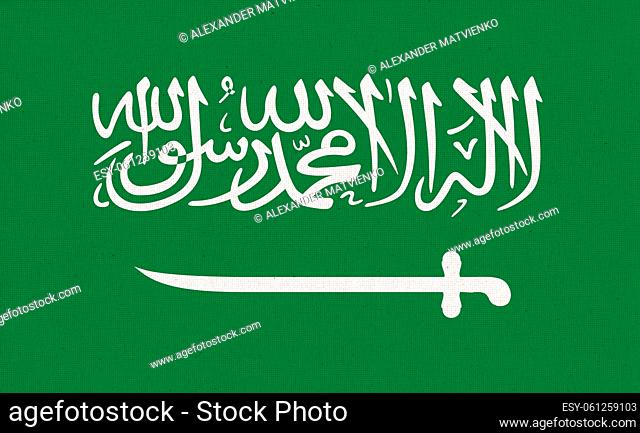 Flag of Saudi Arabia. Saudi Arabian flag on fabric surface. Fabric Texture. National symbol of Kingdom of Saudi Arabia. KSA. Arabian Peninsula