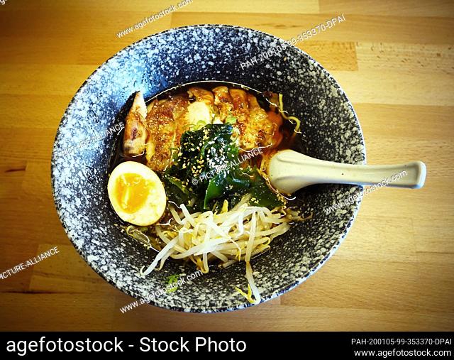 03 December 2019, Berlin: A Pho Bo (Vietnamese soup) with noodles, duck, bean sprouts, seaweed and half a boiled egg, recorded at Restaurant XXX Ramen