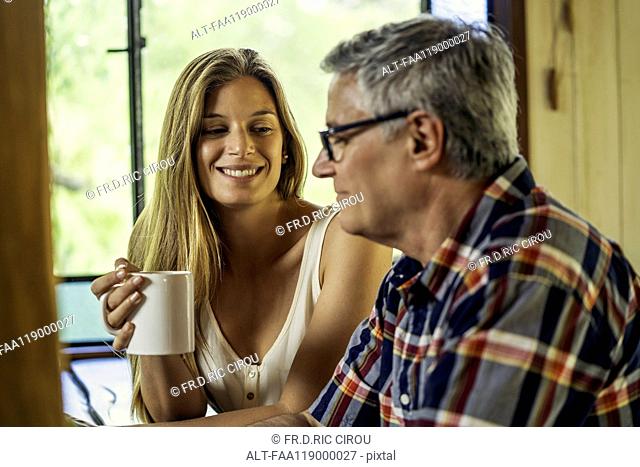 Woman talking with her father
