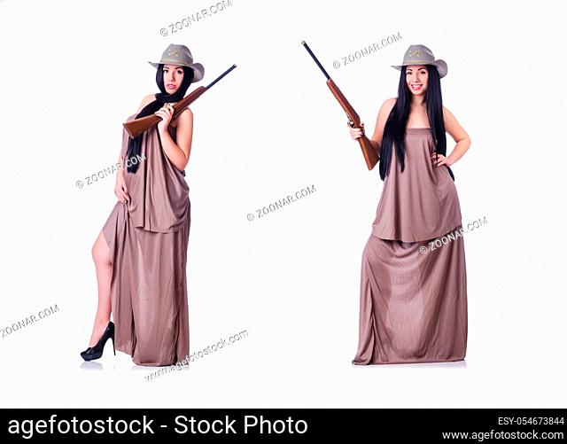 The cowgirl with rifle isolated on the white