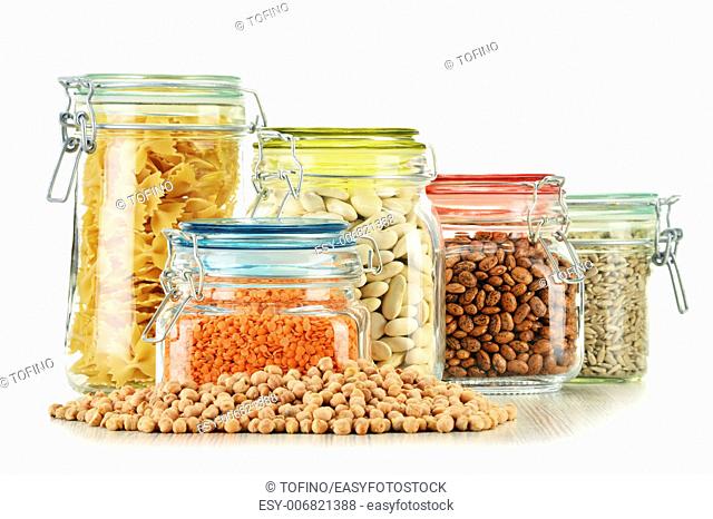 Jars with grain foods isolated on white background