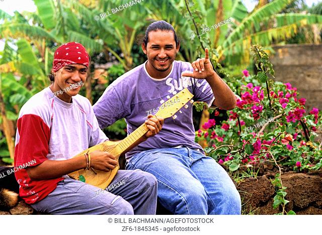 Local native men playing music Easter Island during Tapati Festival Rapa Nui