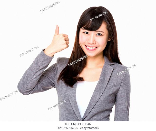 Asian young businesswoman with thumb up gesture