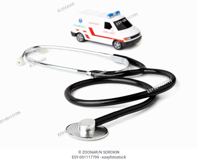 Stethoscope and toy ambulance car