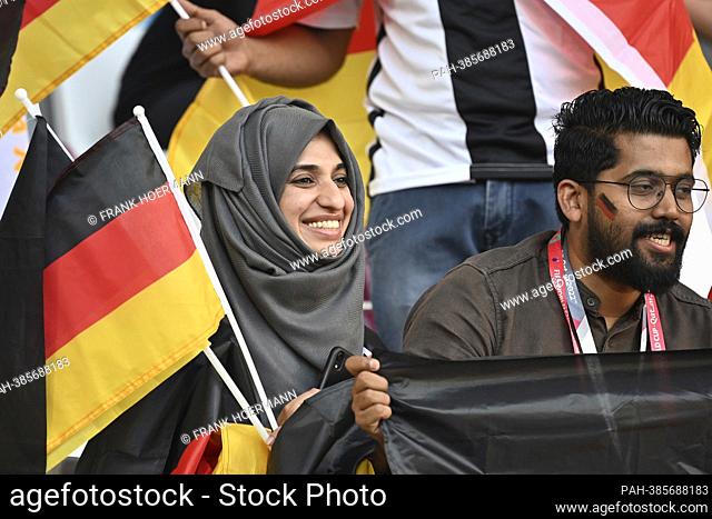 Foreign woman and man pretend to be German fans, soccer fans, Germany (GER) - Japan (JPN) 1-2 group stage Group E on 11/23/2022, Khalifa International Stadium