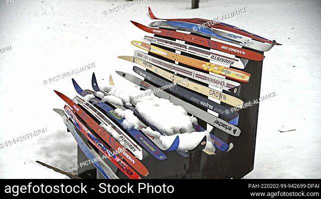 02 February 2022, Bavaria, Ruhpolding: A bench built with discarded cross-country skis stands in deep snow. Photo: Uwe Lein/dpa