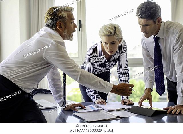 Colleagues working together in office