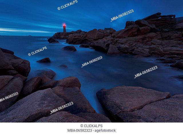 Mean Ruz lighthouse, Brittany, France, The Ploumanach's lighthouse one hour after sunset during the rising tide