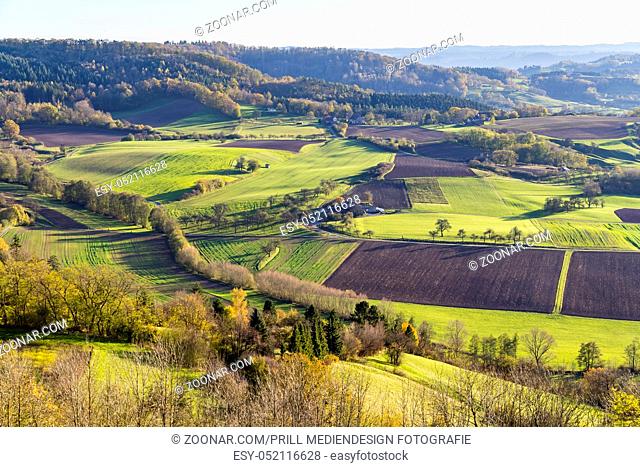 high angle view around a hill named Einkorn near Schwaebisch Hall in the evening at autumn time