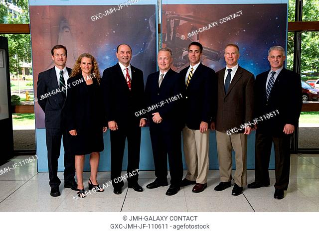 STS-127 crew members pose for a portrait following a preflight press conference at NASA's Johnson Space Center. From the left are astronauts Tom Marshburn