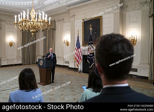 United States President Joe Biden takes questions after delivering remarks on the Covid-19 response and the vaccination program from the State Dining Room of...