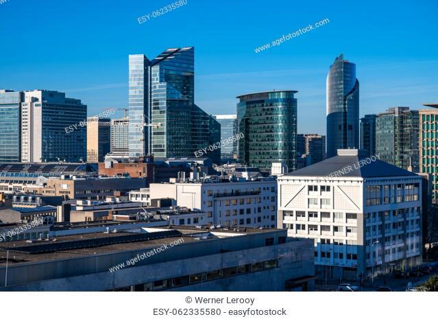 Saint Josse, Brussels Capital Region, Belgium - Feb. 08 2023 - High angle view over Little Manhattan, de financial and business district with a blue sky