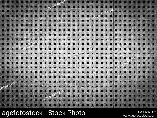 Gray metallic background with perforation of square holes