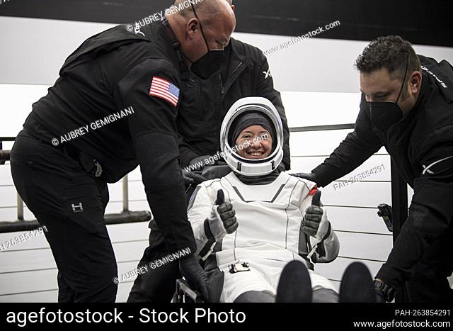NASA astronaut Megan McArthur gives a thumbs up after being helped out of the SpaceX Crew Dragon Endeavour spacecraft onboard the SpaceX GO Navigator recovery...