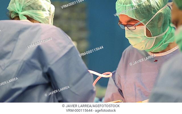 Surgeons in operating theatre , Hip replacement surgery, Orthopedics and Trauma surgery , Hospital