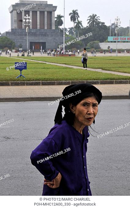 An old woman wait to enter the mausoleum where the former president of the socialist republic of Vietnam, Ho Chi Minh is kept November 11, 2009