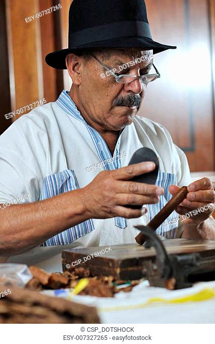 man making luxury handmade cuban cigare