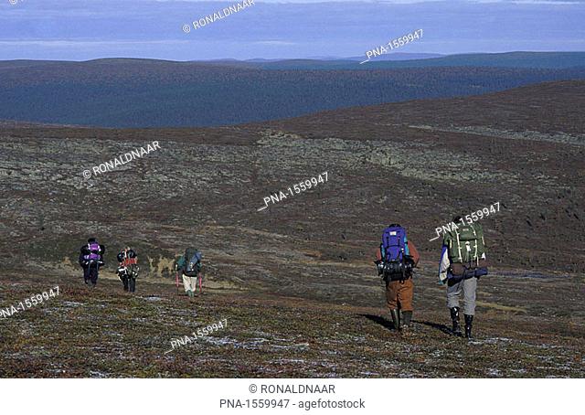 Trekking over the hill tops of Saariselka, the mountainous part of the national park Urho Kekkonen, Northern Finland