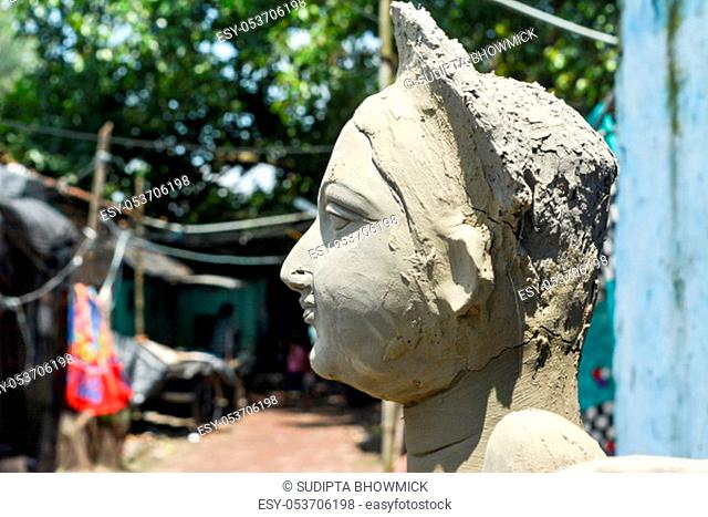 Close up Art model of Maa Durga pratima face. Goddess Durga sculpture made of clay during famous Durga Pooja Celebration