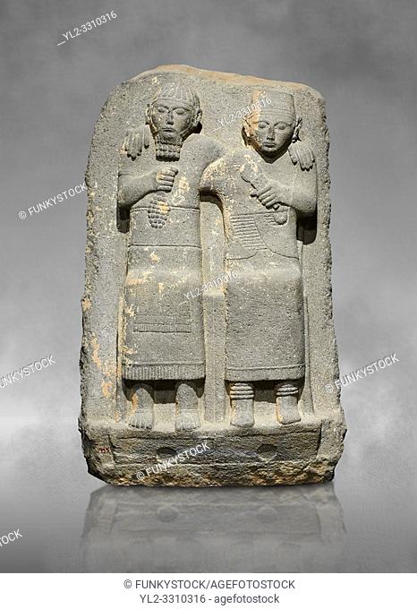 Hittite monumental relief sculpture of of two seated figure, not a typical Hittite style with a lot of other influences. Late Hittite Period - 900-700 BC