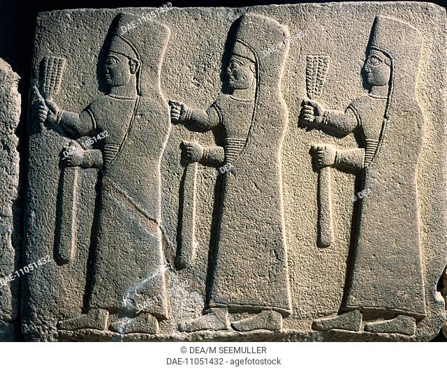 Slab with relief depicting a procession of female bearers of offerings. Artefact from Carchemish, Turkey. Hittite civilization, 9th Century BC