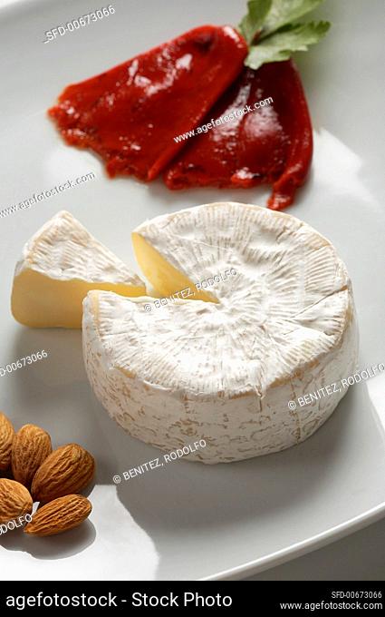 Wheel of Camembert with Wedge Removed, Almonds and Roasted Red Pepper