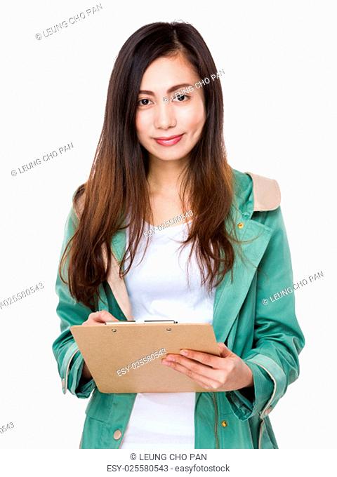 Asian young woman holding with file board