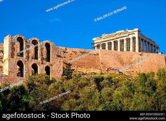 Athens, Attica / Greece - 2018/04/03: Panoramic view of Acropolis of Athens with Parthenon Athena temple and Odeon of Pericles amphitheater