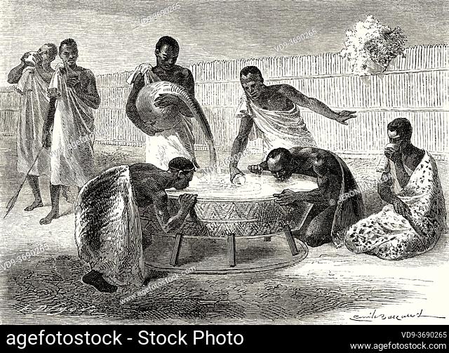 Watering place for pombe, for cooling off in Uganda, Africa. Old XIX century engraved from Le Tour du Monde 1864
