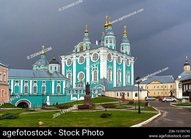 Uspensky cathedral against a background of dark thunderclouds. Smolensk, Russia. The end of April