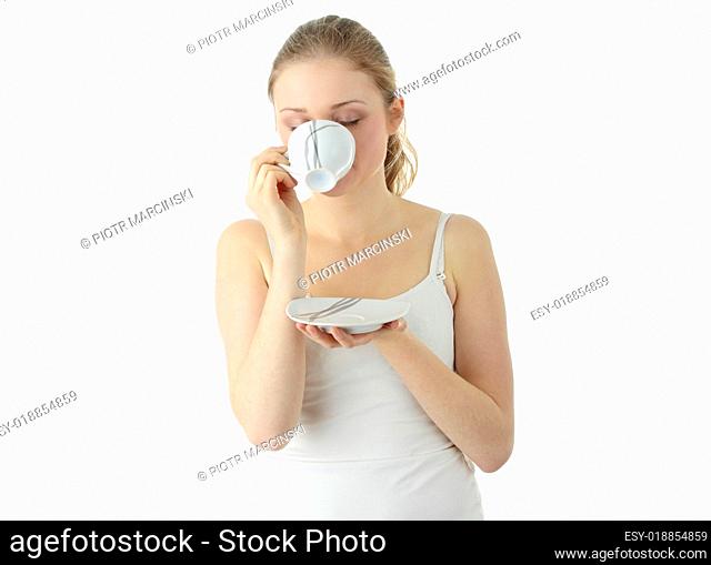 Blond woman drinking coffee