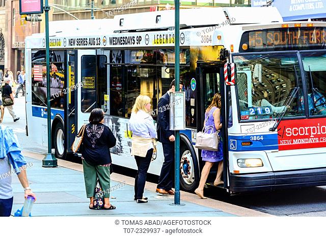 MTA Buses, public transportation, Mass Transit, Midtown Manhattan, 42nd Street, 5th Avenue, New York City, USA. M1, M2, M3, M4, M5 and Q32 bus stop