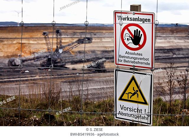 warning sign in front of brown coal surface mining Inden, Germany, North Rhine-Westphalia, Inden