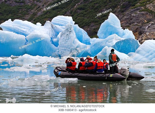 Guests from the Lindblad Expeditions ship National Geographic Sea Bird during Zodiac operations in Tracy Arm, Southeast Alaska, USA