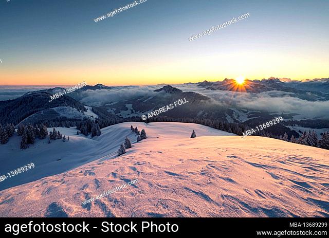 Alpine mountain landscape at sunrise on a cold winter morning. View from Wertacher Hörnle to the Allgäu Alps. Bavaria, Germany, Europe