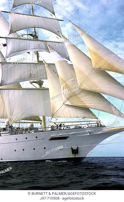 The starborad bow of a clipper ship sailing on the Caribbean Sea off the Central American country of Honduras