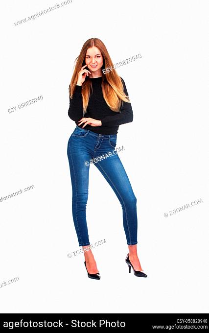 Happy woman in blank black sweater, isolated on white