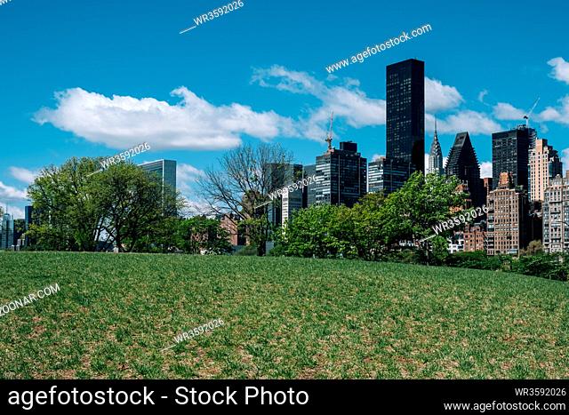 New York City - USA - May 15 2019: Midtown apartment buildings on east riverside view from Roosevelt Island