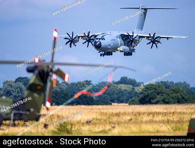 04 July 2021, Mecklenburg-Western Pomerania, Trollenhagen: An A400 M transport aircraft lands at the airfield after airdropping soldiers from the Bundeswehr's...