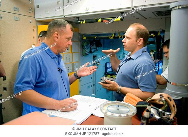NASA astronaut T.J. Creamer (left), Expedition 2223 flight engineer; and cosmonaut Oleg Kotov, Expedition 22 flight engineer and Expedition 23 commander