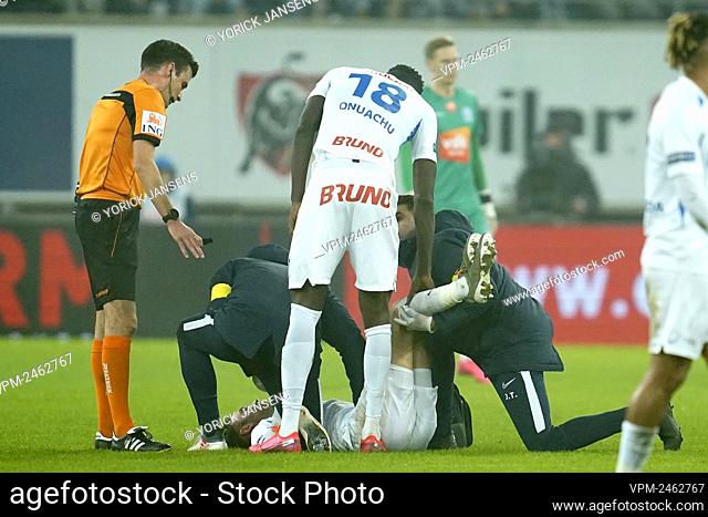 Genk's Dries Wouters lies injured on the ground during a soccer match between KAA Gent and KRC Racing Genk, Saturday 25 January 2020 in Gent